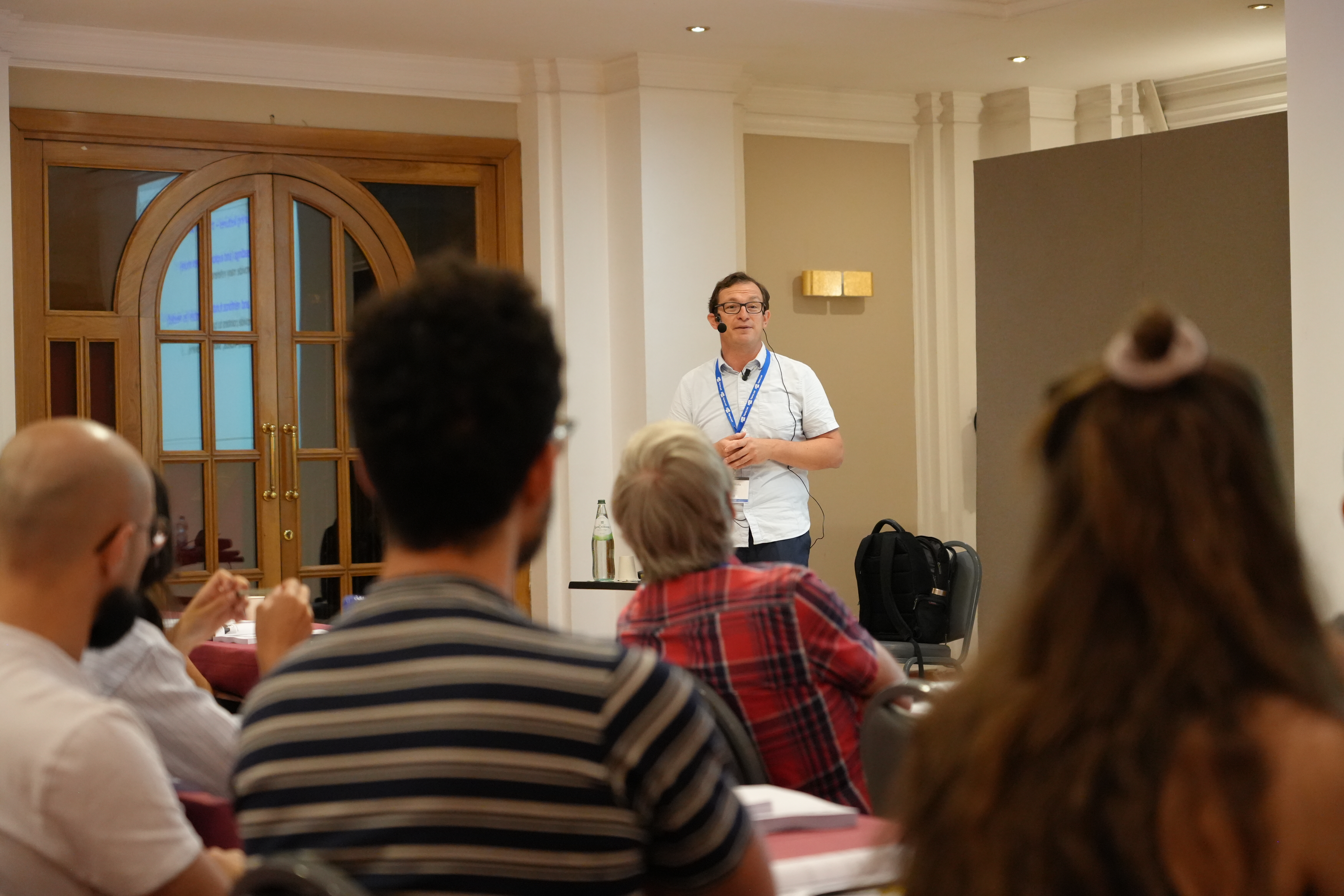 Onur Mutlu teaching at the ACACES 2024 summer school