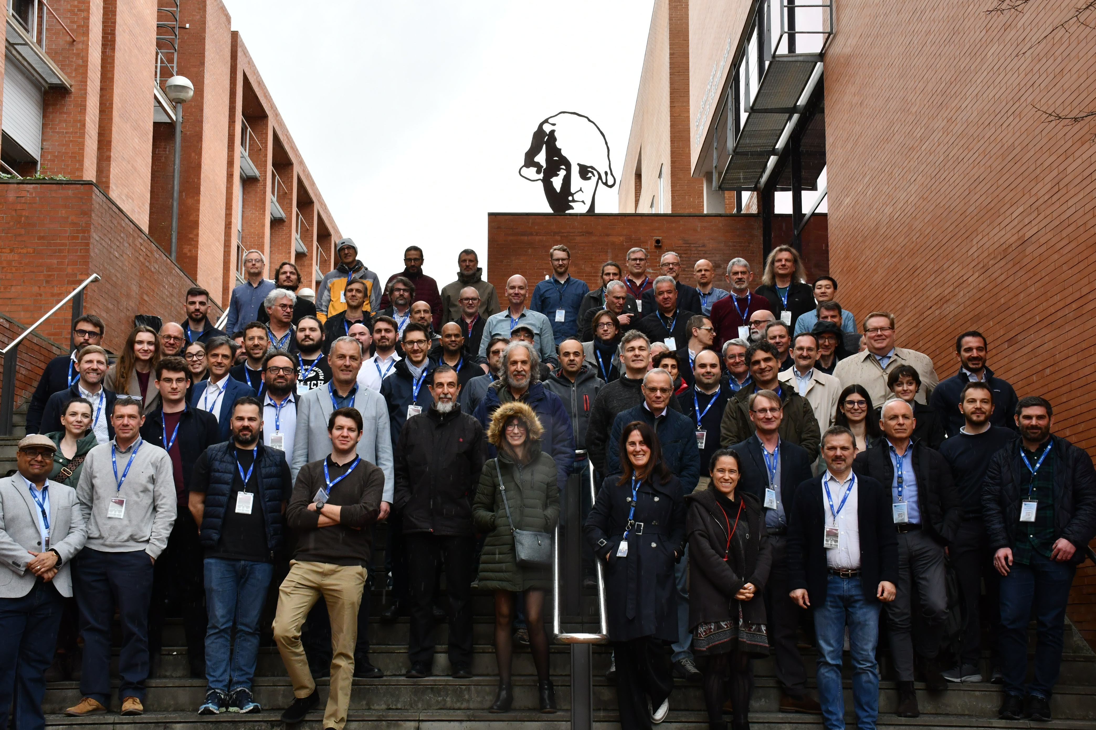Photo of large group of people on the steps at the UPC campus in Barcelona, March 2025