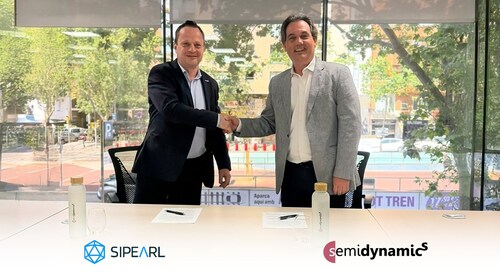 Philippe Notton and Roger Espasa shaking hands