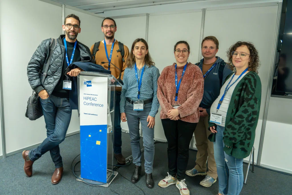 photo of six researchers from the EXTRACT team at the HiPEAC conference 2025